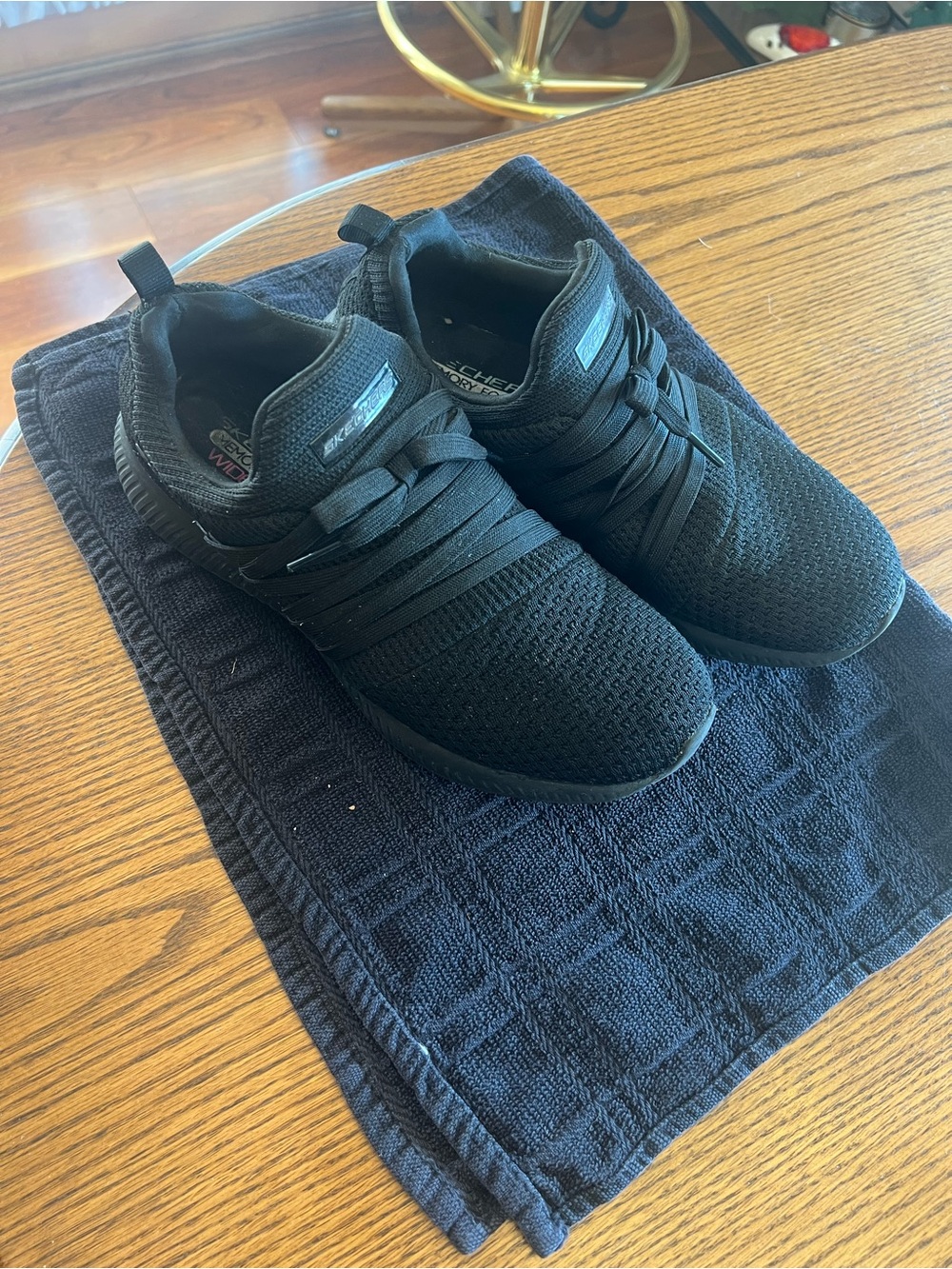 Skechers Women’s Black Knit Slip-On Sneakers.